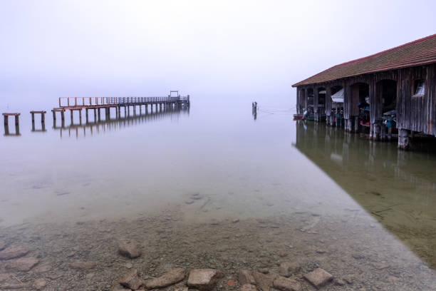 Foggy morning in Schorndorf at Lake Ammersee, Bavaria, Germany