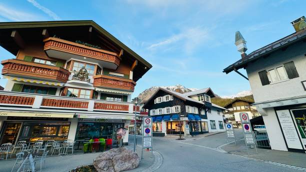 Oberstdorf, Germany - March, 14th - 2024: shopping street and houses in downtown.