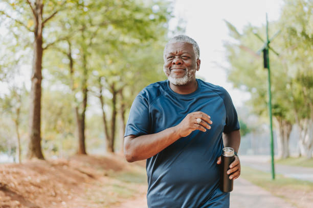 istock Senior man running in public park 2096878146