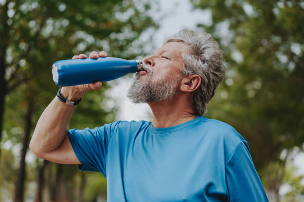 istock Portrait of a senior man drinking water exercising 2096880169