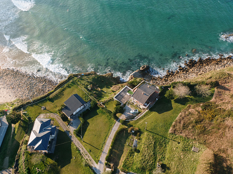 Houses built close to the sea as seen from above