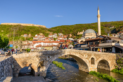 The Old Stone Bridge with Sinan Pasha Mosque in the background in Prizren, Kosovo