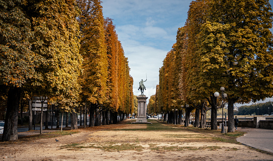 A statue of General Marquis de Lafayette in lovely park Cours la Reine in Paris, France
