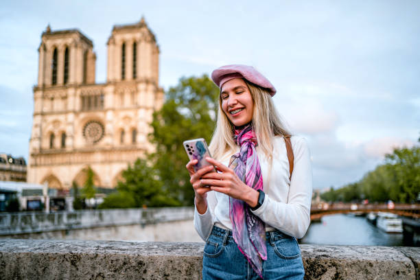 istock Woman using phone in Paris, France 2096967093