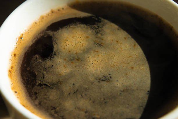 istock Freshly brewed instant coffee. Cup of black coffee, close-up. 2097001302