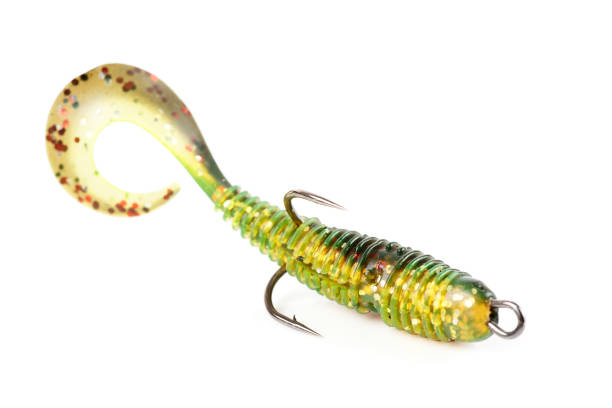 Soft fishing bait for predatory fish, moss green plastic grub, with double hook, isolated on white background