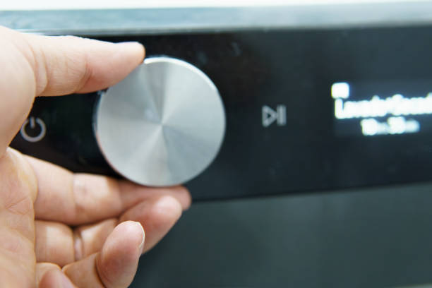 istock a person manipulating a washer dryer 2097013557