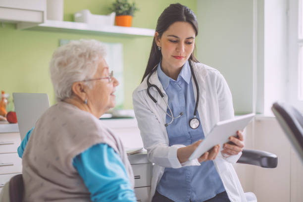 istock Doctor consulting her patient 2097019897