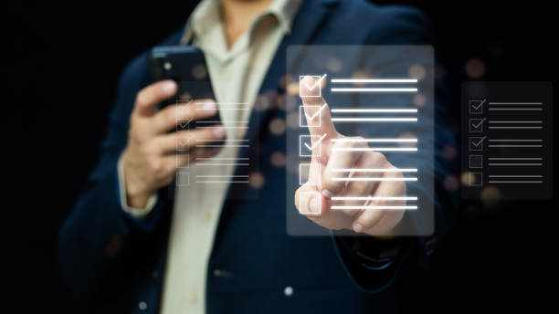 istock Business performance checklist, Business evaluation, project approval and enhancing business performance. Businessman checking mark on check box to approved documents. 2097028054
