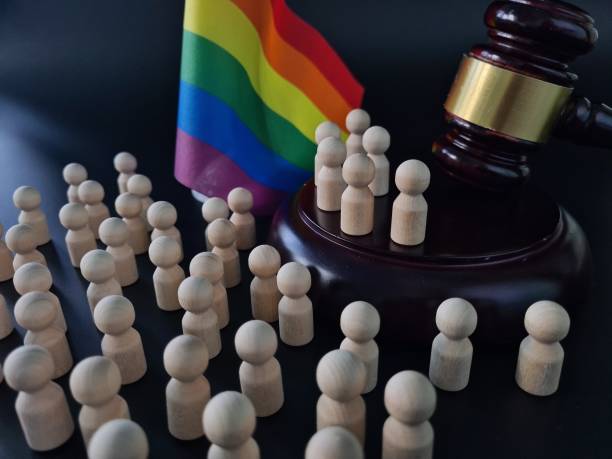 istock Judges Gavel With Rainbow Flag in Background 2097030811
