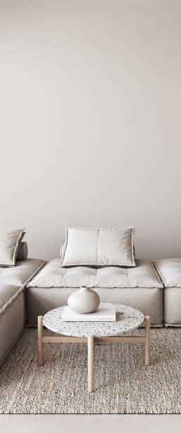 istock Zen like calm in a minimalist space. A neutral-toned modular sofa, terrazzo coffee table, and textured rug in a serene 3d render living room setting 2097031342