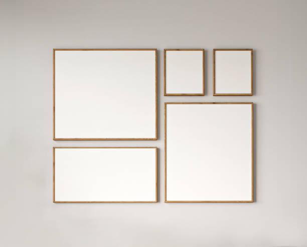 istock Modern gallery wall with a collection of empty picture frames on a muted background 2097049852