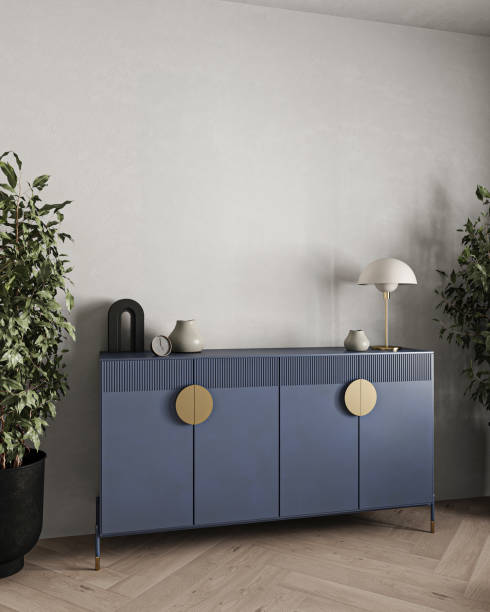istock Sleek sideboard in modern interior design with gold accents and indoor plant adding a touch of elegance 2097076926