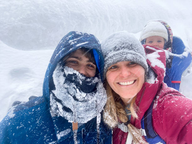 istock Mother hiking with children in winter 2097084385