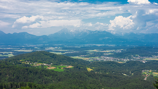 Panorama with Mountains, Forest and Village in the Julian Alps. View from Sveti Jakob Hill