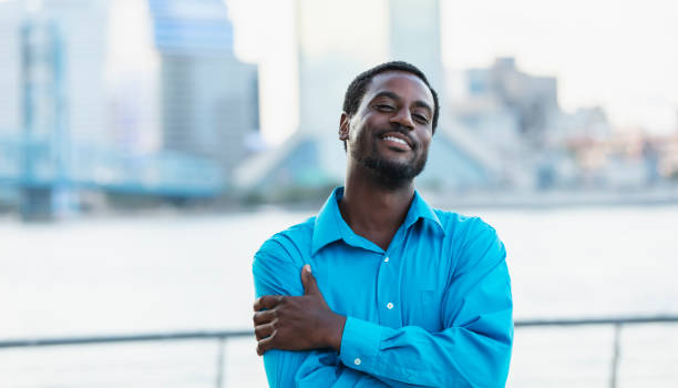 istock African-American man standing on city waterfront 2097101349