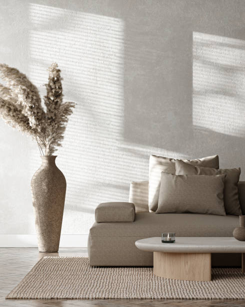 istock Boho livingroom with sofa, dry palm leaves and gray wall background. Light modern nature view. 3d rendering. High quality 3d illustration 2097135643