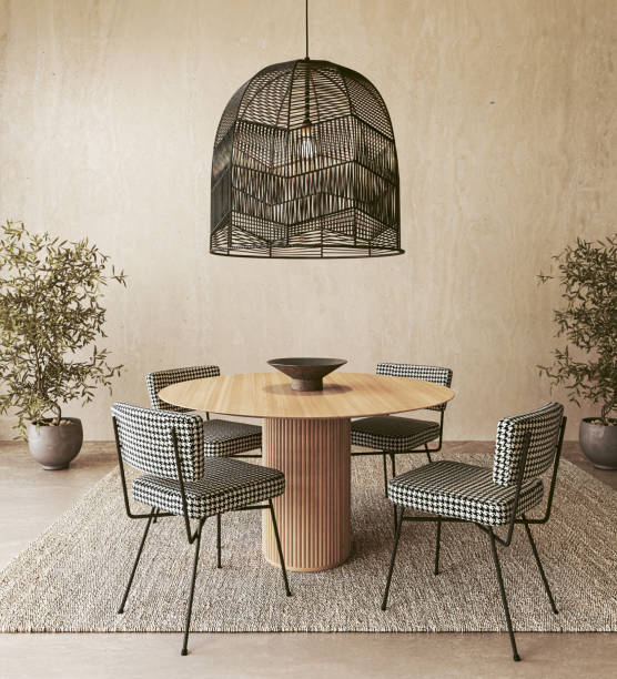 istock Stylish Dining Room with Houndstooth Chairs and Pendant Light 2097151826