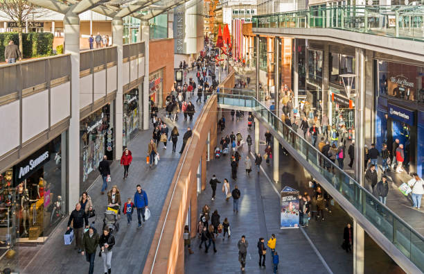 Liverpool View of a busy shopping street in the centre of Liverpool, UK Shops can be seen on either side of the photograph and people can be seen walking on the pavements. mall walker stock pictures, royalty-free photos & images