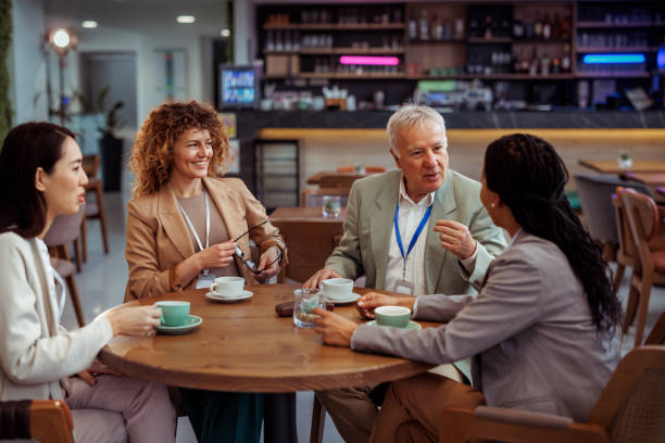 istock Group of diverse business people talking at the cafeteria 2097188287