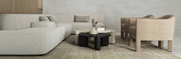 istock Spacious modern living area with comfortable curved couch and neutral toned accent chairs 2097206064