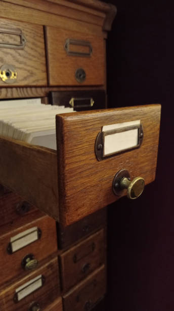 istock Vintage cabinet with library cards or file catalog. 2097209818