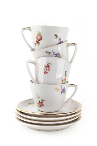 istock Coffee Tea cups and plates isolated on white background. 2097210347
