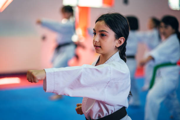 istock Karate training, Kids of different ages in kimono 2097294223