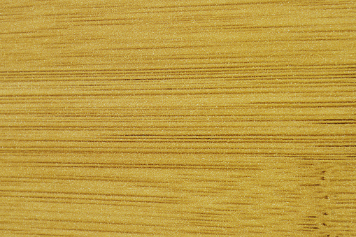 High-quality image showcasing the rich, golden hues and natural grain patterns of wooden texture.
