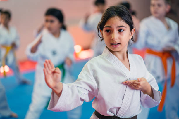 Karate training, Kids of different ages in kimono