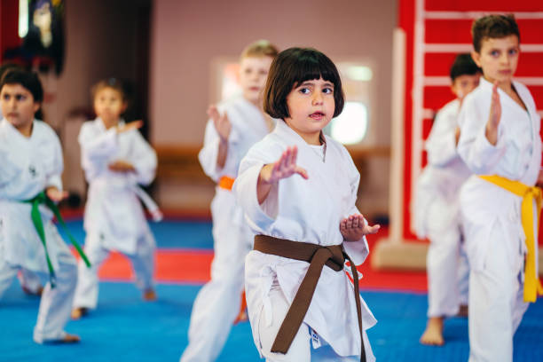 istock Karate training, Kids of different ages in kimono 2097374220