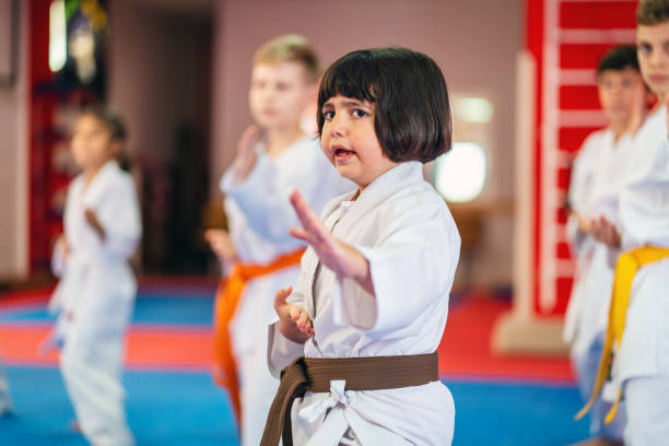 istock Karate training, Kids of different ages in kimono 2097388114