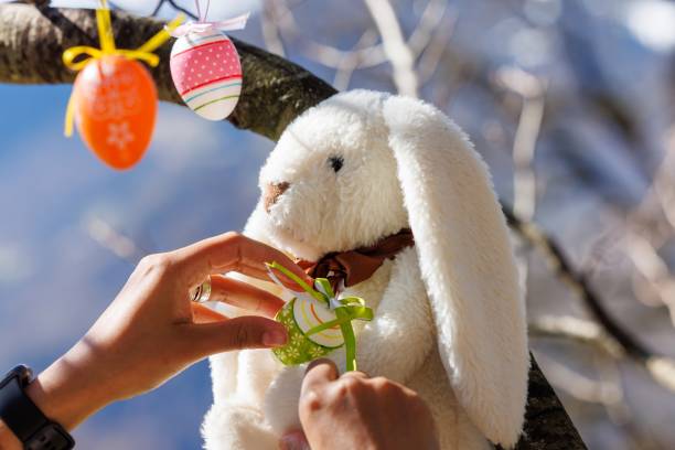 Easter Wreath on Weathered Wood: Colorful Eggs Signaling Spring's Arrival