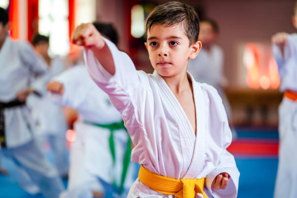 istock Karate training, Kids of different ages in kimono 2097424633