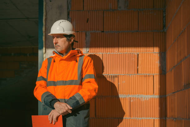 istock Portrait of construction engineer on building site 2097431902