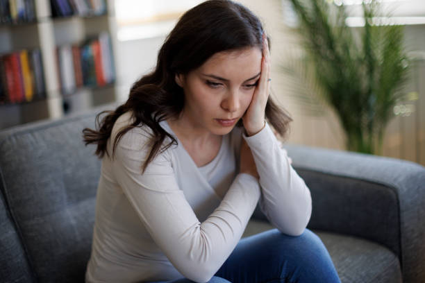 istock Unhappy stressed young woman regretting of wrong decision 2097483652