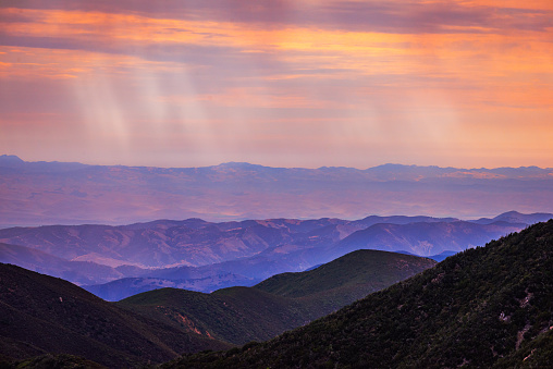 Sun rising over Salinas Valley from high vantage point in the Los Padres National Forest.