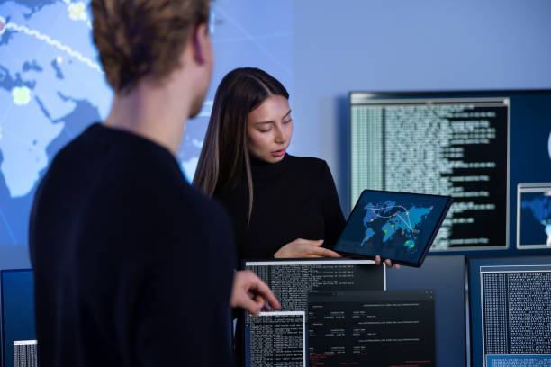 istock Cyber security team working in a Cyber Security Operations Center SOC to protect systems and technologies 2097530266