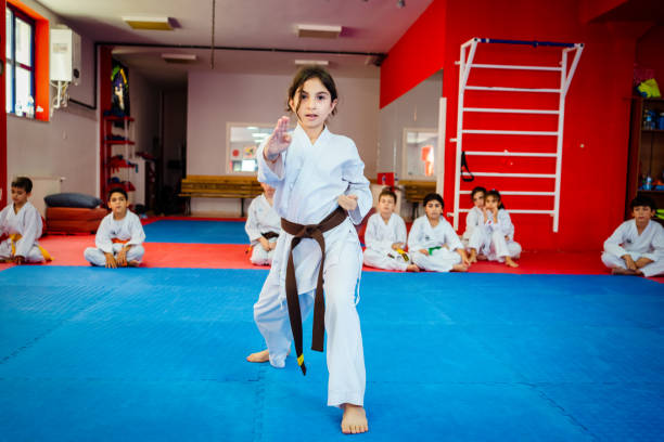 istock Karate training, Kids of different ages in kimono 2097555086
