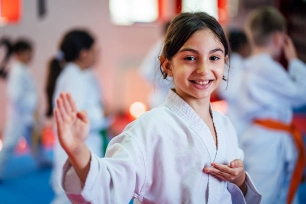 istock Karate training, Kids of different ages in kimono 2097566519