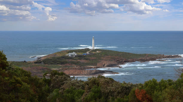 istock Cape Leeuwin Lighthouse, the tallest lighthouse on mainland Australia, situated at the most south-westerly point of Australia, at the tip of a spectacular peninsula where the Southern and Indian Oceans meet. 2097681179