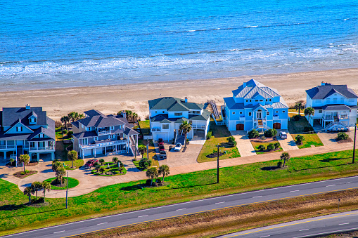 A new luxury beachfront subdivision located on Galveston Island, Texas along the Gulf of Mexico shot via helicopter from an altitude of about 600 feet.