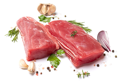 Fresh tuna Fish steak isolated on a white background.