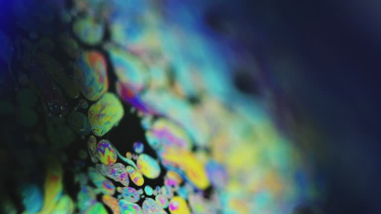 Bubble fluid oil liquid mix blue pink ink flow