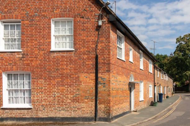 istock Row of brick country cottages 2097787852