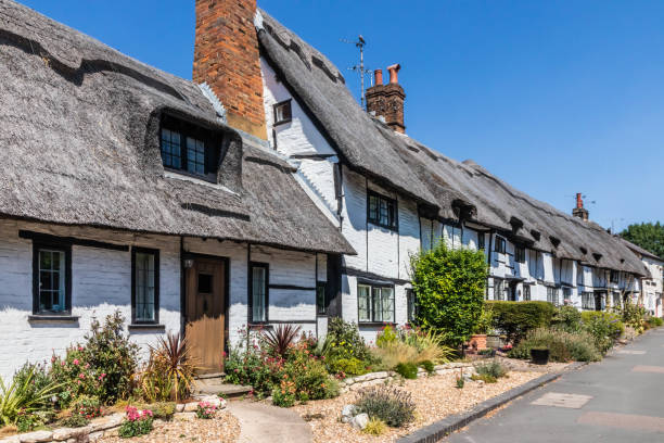 istock Traditional English thatched cottages 2097789378