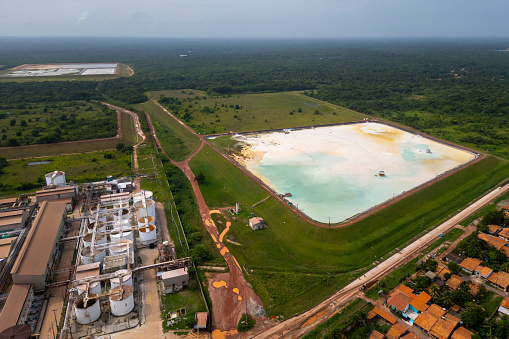 Barcarena, Para, Brazil - Feb 12, 2024: Aerial drone view of waste depot of the industrial plant of Imerys, a company that processes kaolin and export globally.