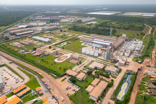 Barcarena, Para, Brazil - Feb 12, 2024: Aerial drone view of the industrial plant of Imerys, a company that processes kaolin and export globally.