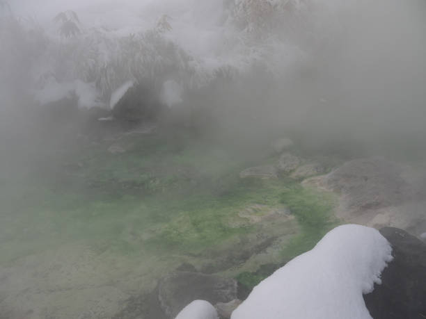istock Volcanic Thermal river and bamboo covered with snow scenic winter view 2097871166