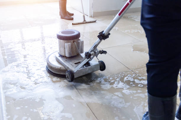 istock Janitor use floor scrubber machine on the floor hallway office building or walkway after school and classroom work job with sun light background. 2098028629